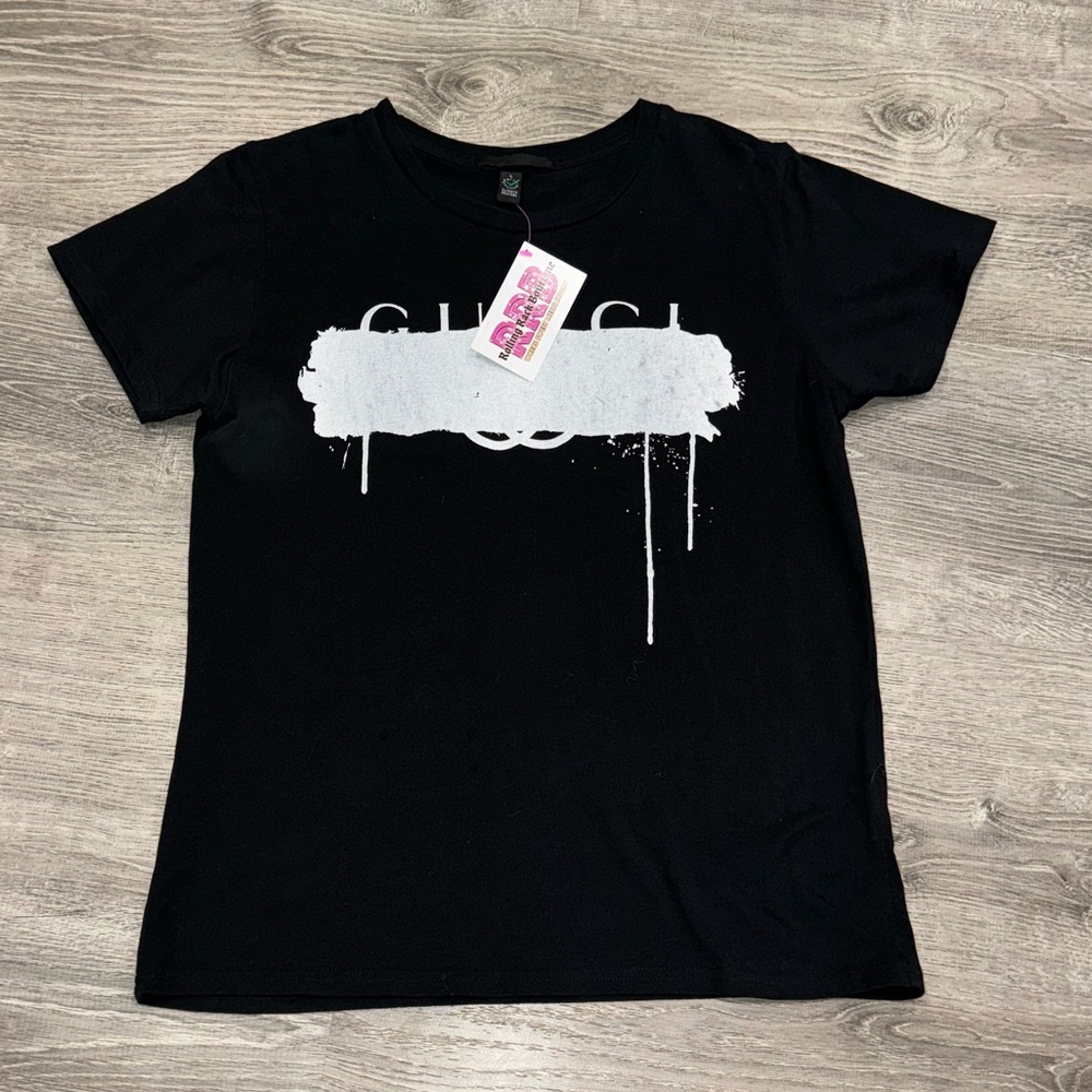 NWT GUCCI CROSSOUT BLACK LOGO TEE SHIRT L URBAN OUTFITTERS KITH